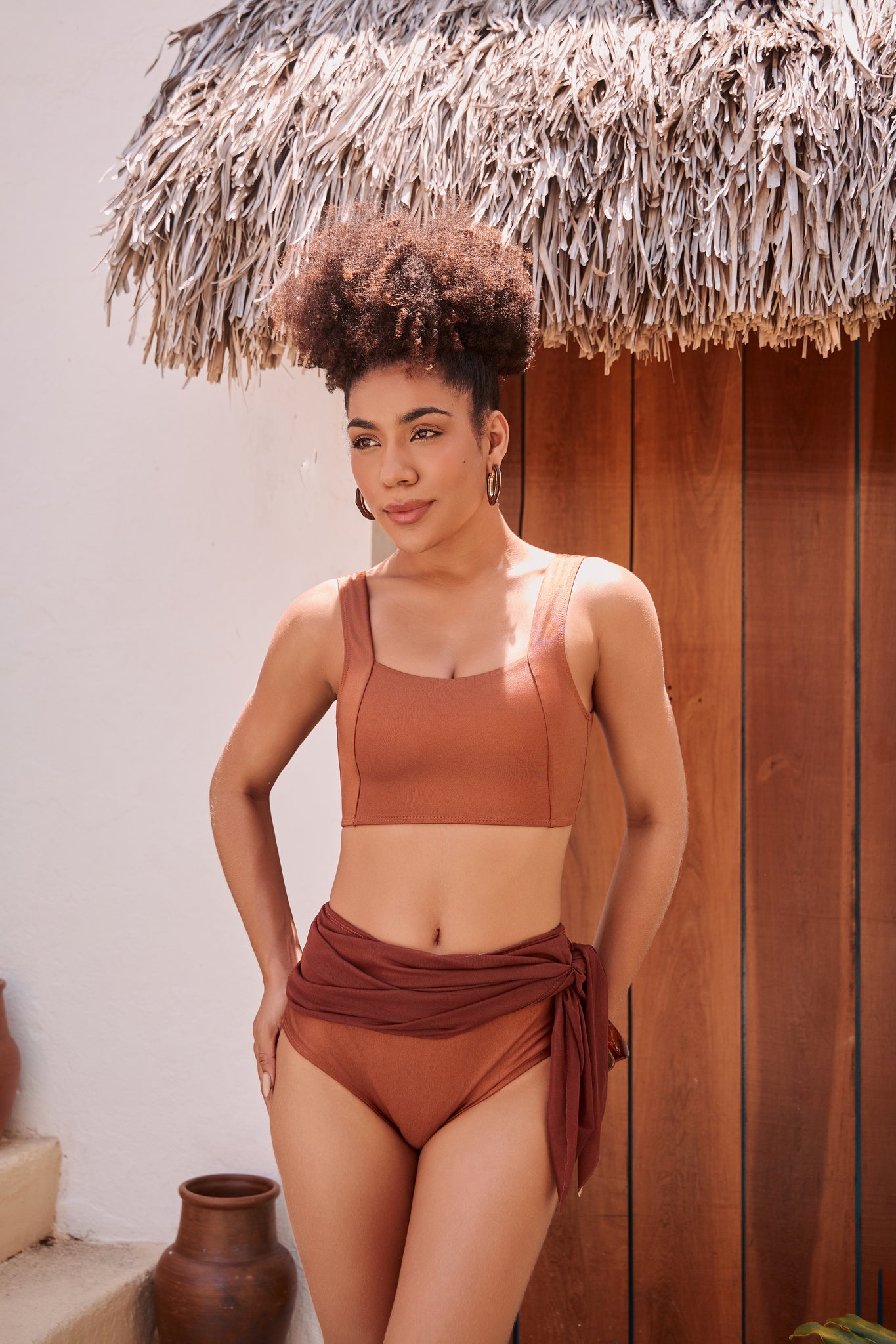 Orixah Suntrail Resort Set in rust with wrap skirt and side knot detail, side view